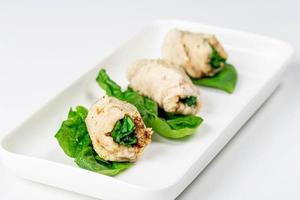 Ready-made chicken rolls with spices and spinach