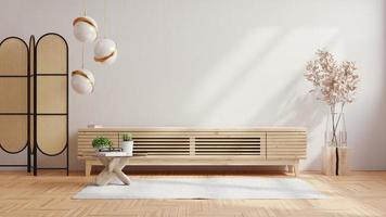 mueble para tv en salón moderno con planta sobre fondo de pared blanca. foto