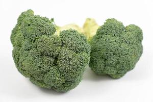 Fresh Broccoli on the white background photo