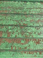 Wooden wall with weathered paint texture photo