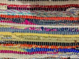 Colored textile carpet background. Carpet texture photo