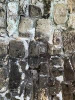 Old stone wall background. Stone backdrop photo