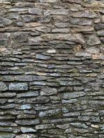 Old stone wall background. Stone backdrop photo