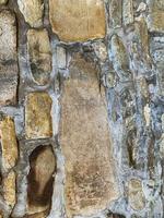 Old stone wall background. Stone backdrop photo