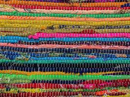 fondo de alfombra textil de color. textura de la alfombra foto