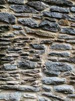 Old stone wall background. Stone backdrop photo