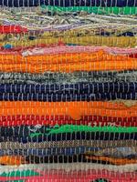 Colored textile carpet background. Carpet texture photo