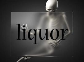 liquor word on glass and skeleton photo