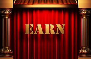earn golden word on red curtain photo