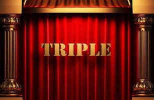 triple golden word on red curtain photo