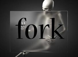 fork word on glass and skeleton photo