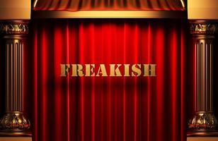 freakish golden word on red curtain photo