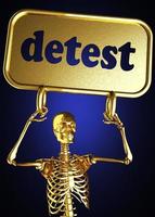 detest word and golden skeleton photo