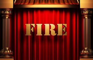 fire golden word on red curtain photo