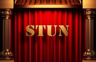 stun golden word on red curtain photo