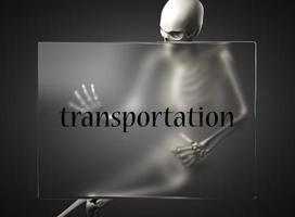 transportation word on glass and skeleton photo
