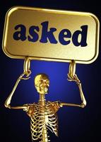 asked word and golden skeleton photo