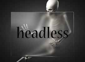 headless word on glass and skeleton photo