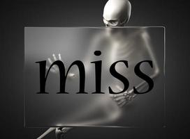 miss word on glass and skeleton photo