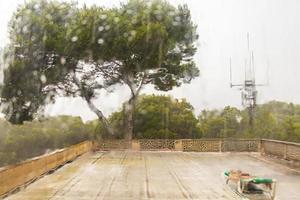 Rainy roof terrace with sun lounger in the hostel Mallorca. photo