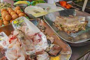 Disgusting Thai Chinese street food market China Town Bangkok Thailand. photo