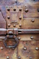 Old Rusty Door and Sliding Bolt in Citta Alta Bergamo photo