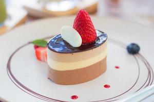 Smooth chiffon cake on top with chocolate sauce photo