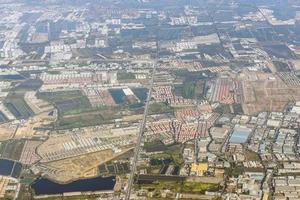 Top view of Residential area, Thailand suburb area. View from the window of an airplane photo
