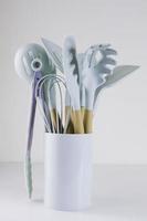 Kitchen tools on the table on a white background. photo