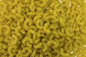 Macro photo food product raw macaroni. Image texture macaroni.