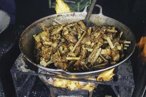 cooking tengkleng kambing or goat tengkleng is a kind of soup with the main ingredient of goat bones. photo