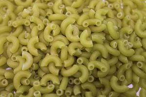 Macro photo food product raw macaroni. Image texture macaroni.