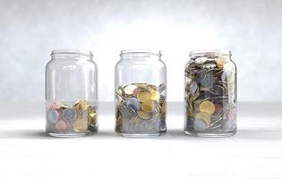 Coins in a glass jar, Money saving concept. photo