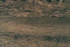 Top view brown wooden texture background. Brown and black natural surface pattern of wooden plank abstract texture background. Above view of old wooden table. Weathered wood.Timber wooden wall. photo