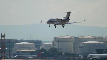 Side view of business jet landing video