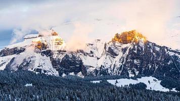 Snow-capped mountain with sunlight in Jungfrau, Interlaken, Switzerland.