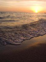 Beautiful beach sunset, natural scene, Sand, water, sky photo