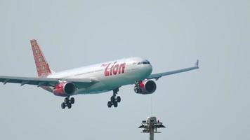 Airbus 330 approaching over ocean video