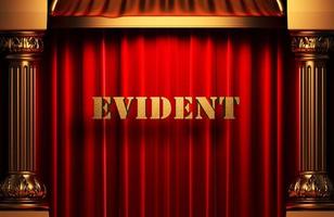 evident golden word on red curtain photo