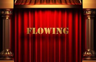 flowing golden word on red curtain photo