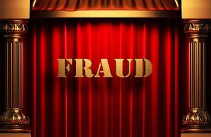 fraud golden word on red curtain photo