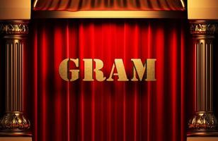 gram golden word on red curtain photo