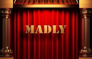 madly golden word on red curtain photo