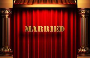 married golden word on red curtain photo