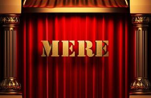 mere golden word on red curtain photo