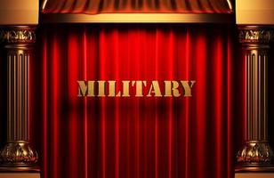 palabra dorada militar en cortina roja foto