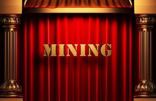 mining golden word on red curtain photo