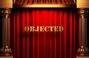 objected golden word on red curtain photo