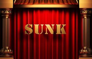 sunk golden word on red curtain photo