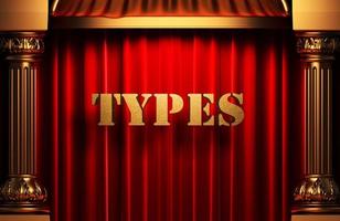 types golden word on red curtain photo